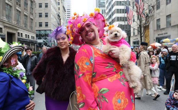 People participate in the annual Easter Parade and Bonnet Festival on Fifth Avenue in New York City on April 5, 2026. (Photo by TIMOTHY A. CLARY / AFP via Getty Images)
