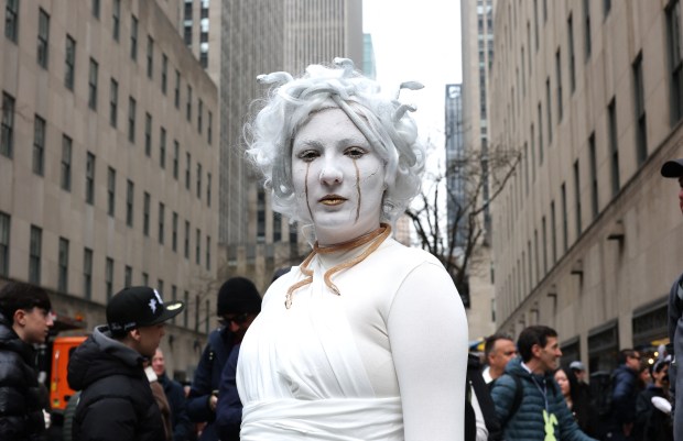 People participate in the annual Easter Parade and Bonnet Festival on Fifth Avenue in New York City on April 5, 2026. (Photo by TIMOTHY A. CLARY / AFP via Getty Images)