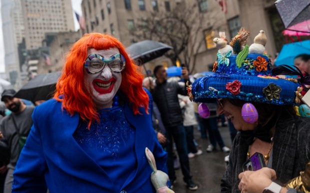 People dress in elaborate hats and costumes during the annual Easter Parade and Bonnet Festival outside of St. Patrick's Cathedral on Fifth Avenue on April 5, 2026 in New York City. (Photo by Spencer Platt/Getty Images)