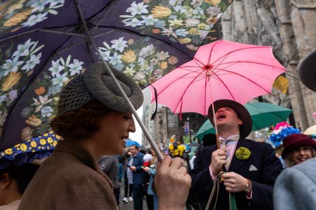 People dress in elaborate hats and costumes during the annual Easter Parade and Bonnet Festival outside of St. Patrick's Cathedral on Fifth Avenue on April 5, 2026 in New York City. (Photo by Spencer Platt/Getty Images)