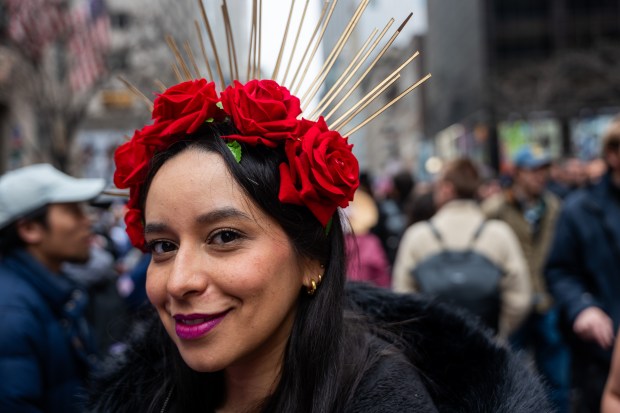 People dress in elaborate hats and costumes during the annual Easter Parade and Bonnet Festival outside of St. Patrick's Cathedral on Fifth Avenue on April 5, 2026 in New York City. (Photo by Spencer Platt/Getty Images)