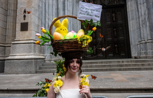 People dress in elaborate hats and costumes during the annual Easter Parade and Bonnet Festival outside of St. Patrick's Cathedral on Fifth Avenue on April 5, 2026 in New York City. (Photo by Spencer Platt/Getty Images)