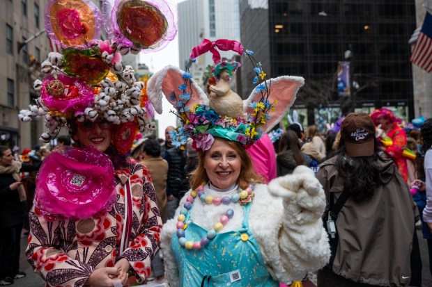 People dress in elaborate hats and costumes during the annual Easter Parade and Bonnet Festival outside of St. Patrick's Cathedral on Fifth Avenue on April 5, 2026 in New York City. (Photo by Spencer Platt/Getty Images)
