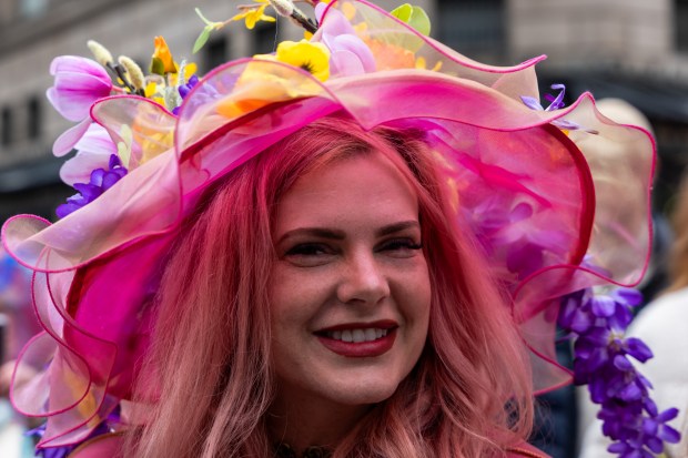 People dress in elaborate hats and costumes during the annual Easter Parade and Bonnet Festival outside of St. Patrick's Cathedral on Fifth Avenue on April 5, 2026 in New York City. (Photo by Spencer Platt/Getty Images)
