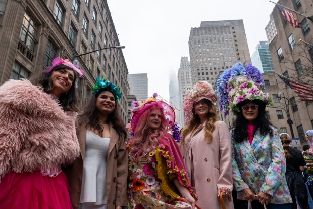 People dress in elaborate hats and costumes during the annual Easter Parade and Bonnet Festival outside of St. Patrick's Cathedral on Fifth Avenue on April 5, 2026 in New York City. (Photo by Spencer Platt/Getty Images)