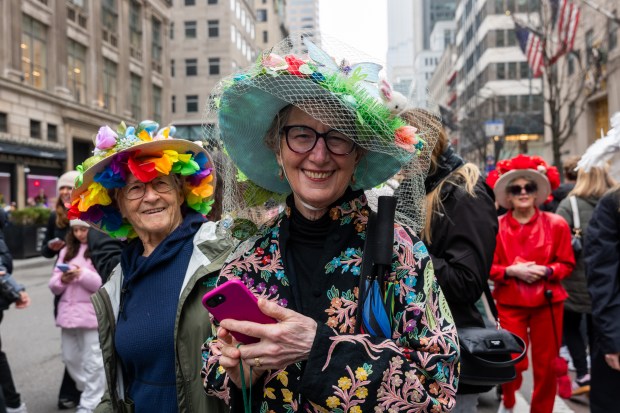 People dress in elaborate hats and costumes during the annual Easter Parade and Bonnet Festival outside of St. Patrick's Cathedral on Fifth Avenue on April 5, 2026 in New York City. (Photo by Spencer Platt/Getty Images)