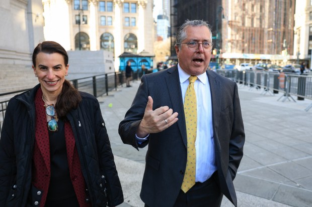 (L/R) Karen Agnifilo walks with Marc Agnifilo, lead attorney for Sean "Diddy" Combs," as they arrive at the Thurgood Marshall US Courthouse in New York on April 9, 2026. (Photo by TIMOTHY A.CLARY / AFP via Getty Images)