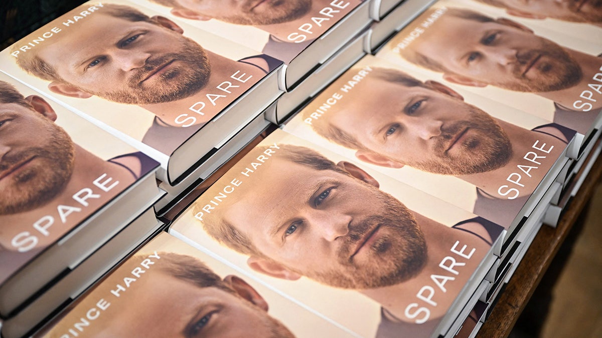 Copies of Prince Harry's book Spare displayed on a table at Daunt Books in London