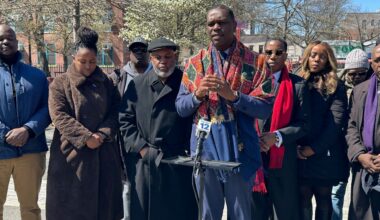 Pastor Gilford T. Monrose speaks during a rally held by supporters of New York City Council Member Farah Louis and her sister, Debbie Louis, an aide to the Gov. Kathy Hochul