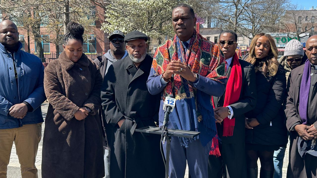 Pastor Gilford T. Monrose speaks during a rally held by supporters of New York City Council Member Farah Louis and her sister, Debbie Louis, an aide to the Gov. Kathy Hochul