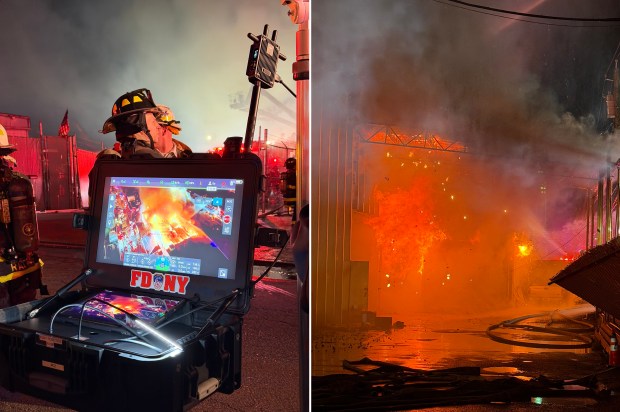 FDNY firefighters respond to a fire inside a two-story building on Friday around 7:30 p.m. on 130th st. and 23rd ave. in College Point where no one was reported to be inside of the building. (FDNY)