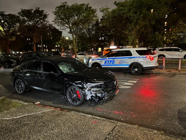 The scene where an 11-year-old boy was struck by a black Acura on Ocean Pkwy. and Avenue V in Brooklyn on October 13, 2025. (Kerry Burke / New York Daily News) 