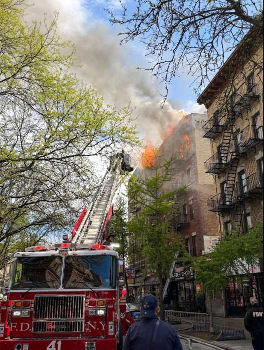 FDNY extinguishing the blaze on 660 E 187th Street.