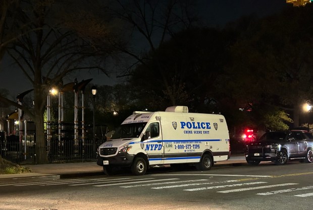Police investigate the scene where a 15 year-old boy was shot and killed in Roy Wilkins Park in St Albans, Queens on Thursday, April 16, 2026. Kerry Burke/New York Daily News)