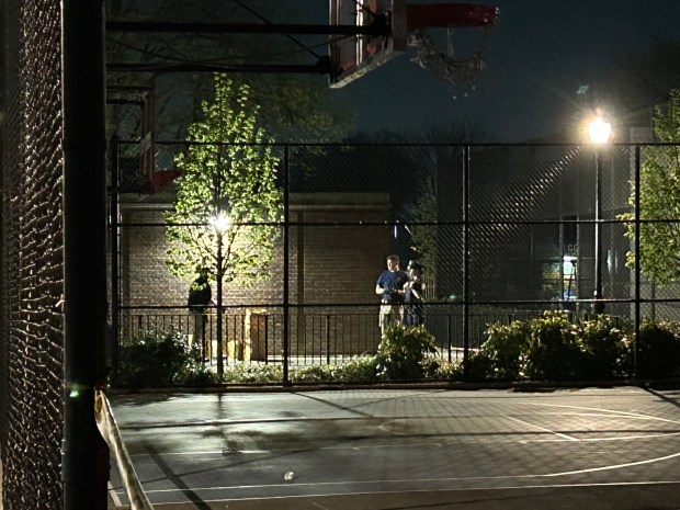Police investigate the scene where a 15 year-old boy was shot and killed in Roy Wilkins Park in St Albans, Queens on Thursday, April 16, 2026. Kerry Burke/New York Daily News)