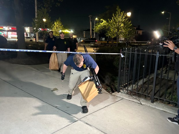 Police investigate the scene where a 15 year-old boy was shot and killed in Roy Wilkins Park in St Albans, Queens on Thursday, April 16, 2026. Kerry Burke/New York Daily News)