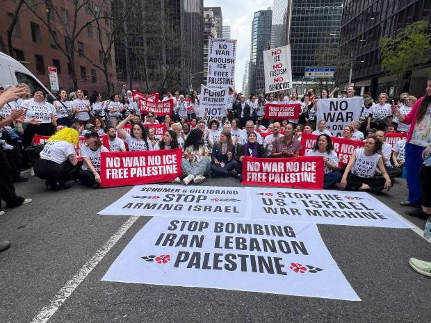 Protesters block Third Ave. in Manhattan outside the office of Sen. Chuck Schumer during an anti-war demonstration on Monday, April 13, 2026.