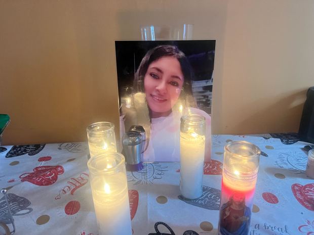 A memorial for victim Jenny Maribel Chacho Sánchez, 30, at her family's home in Ridgewood. (Emma Seiwell / New York Daily News)