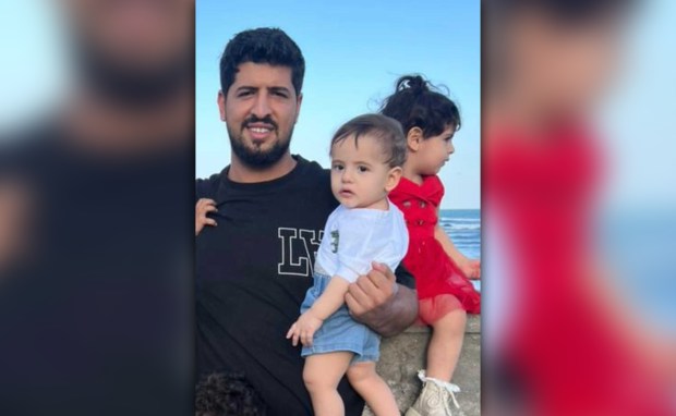 Slain deli worker Abdul Saleh is pictured in a recent photo with his 3-year-old daughter and 2-year-old son. (Courtesy of Family)