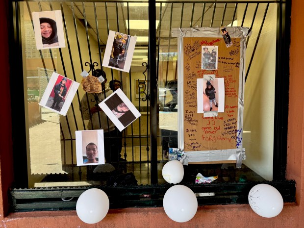 A memorial is set up Monday outside 30 Richman Plaza in the Bronx for victim Justin Chatfield, who was fatally shot inside the building on Thursday, April 2, 2026. (Rebecca White / New York Daily News)