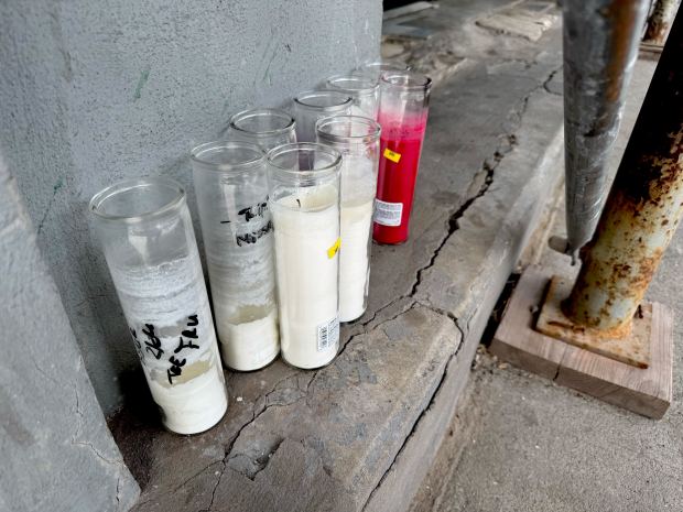 A small memorial outside 104 Tapscott St. in Brookyn for Terrence Smith. 