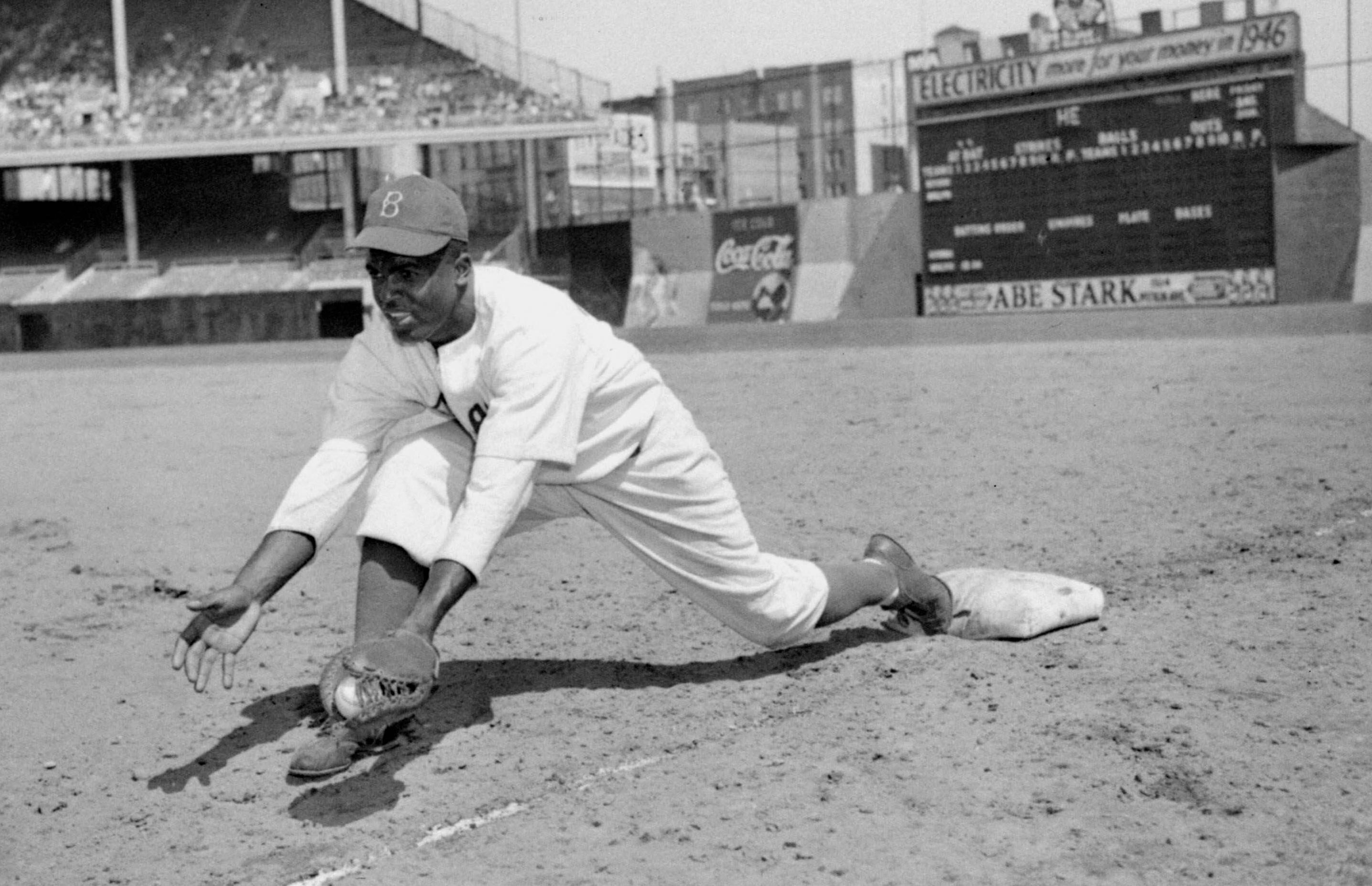 FILE – Jackie Robinson, Brooklyn Dodgers’ first baseman, is shown...