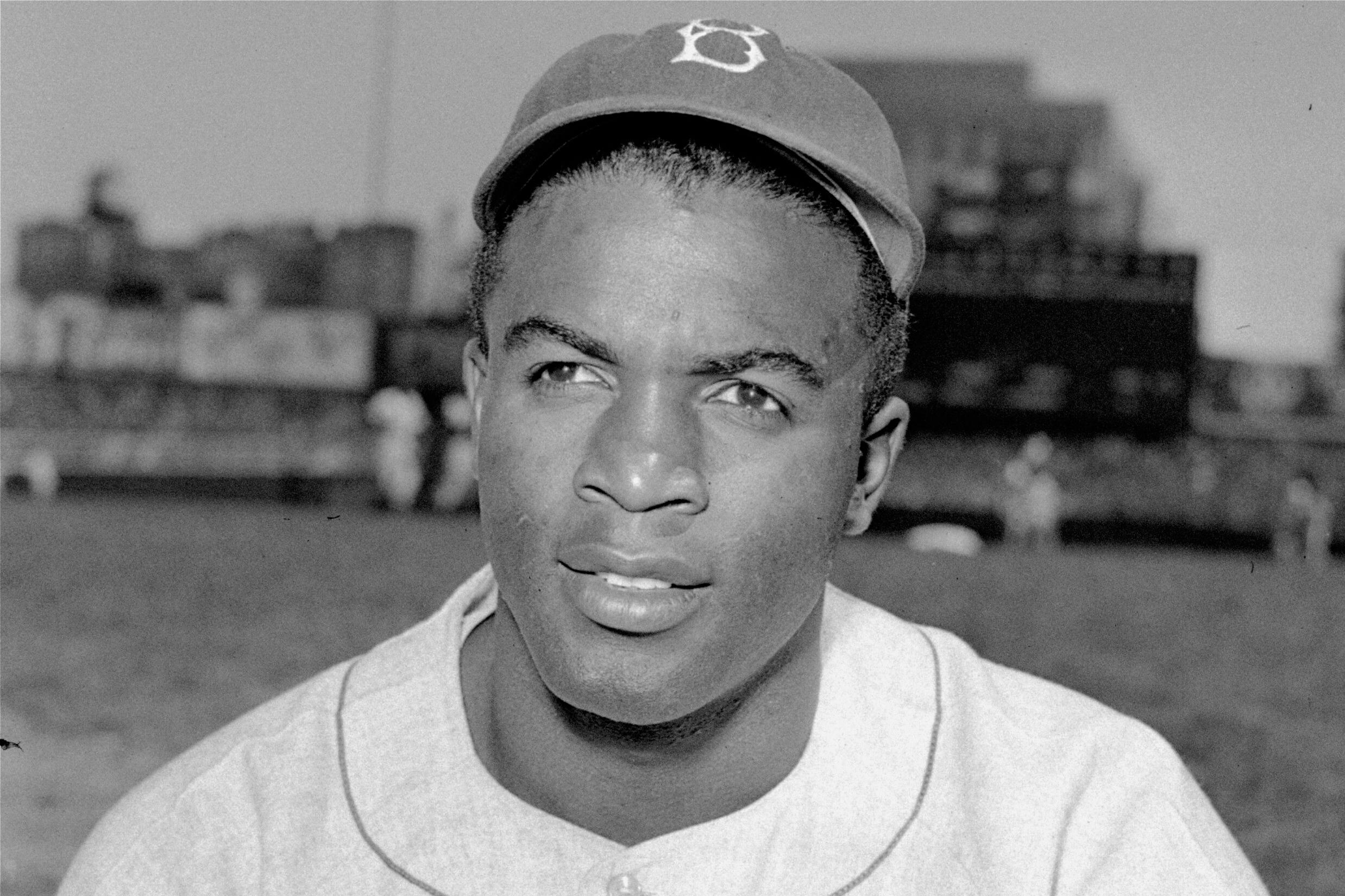 FILE – Brooklyn Dodgers’ infielder Jackie Robinson is photographed on...