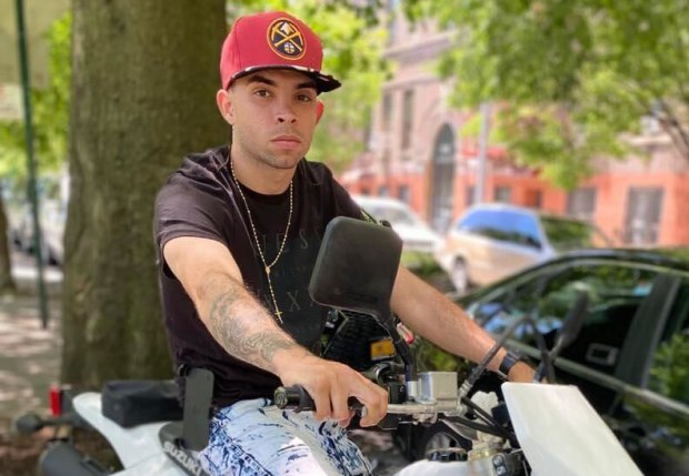 Eric Duprey (pictured), a scooter-riding suspect fleeing a Bronx buy-and-bust drug sting, died Aug. 23, 2023, after an NYPD sergeant grabbed a cooler from a nearby family get-together and hurled it at the man, knocking him to the ground.