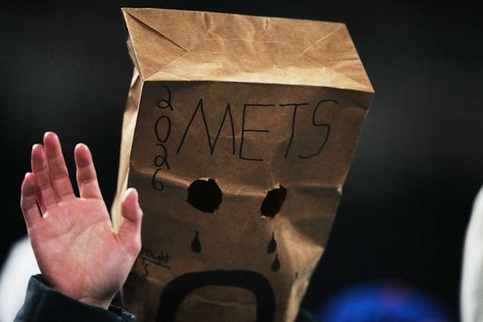 Mets fans mostly stay home but fill Citi Field with late boos as New York's skid hits 12 games
