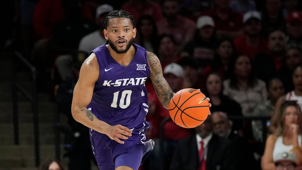 Kansas State guard David Castillo (10) controls the ball during the first half of an NCAA...