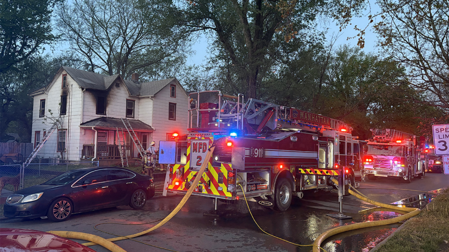 Firefighters rescue unconscious person from burning Manhattan residence