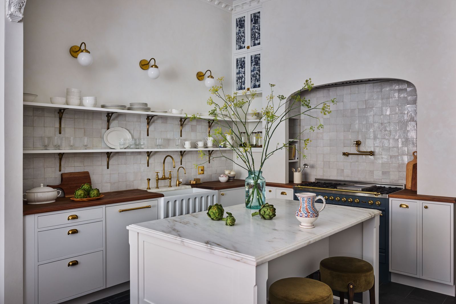 Image may contain Indoors Kitchen Interior Design Kitchen Island Sink and Sink Faucet