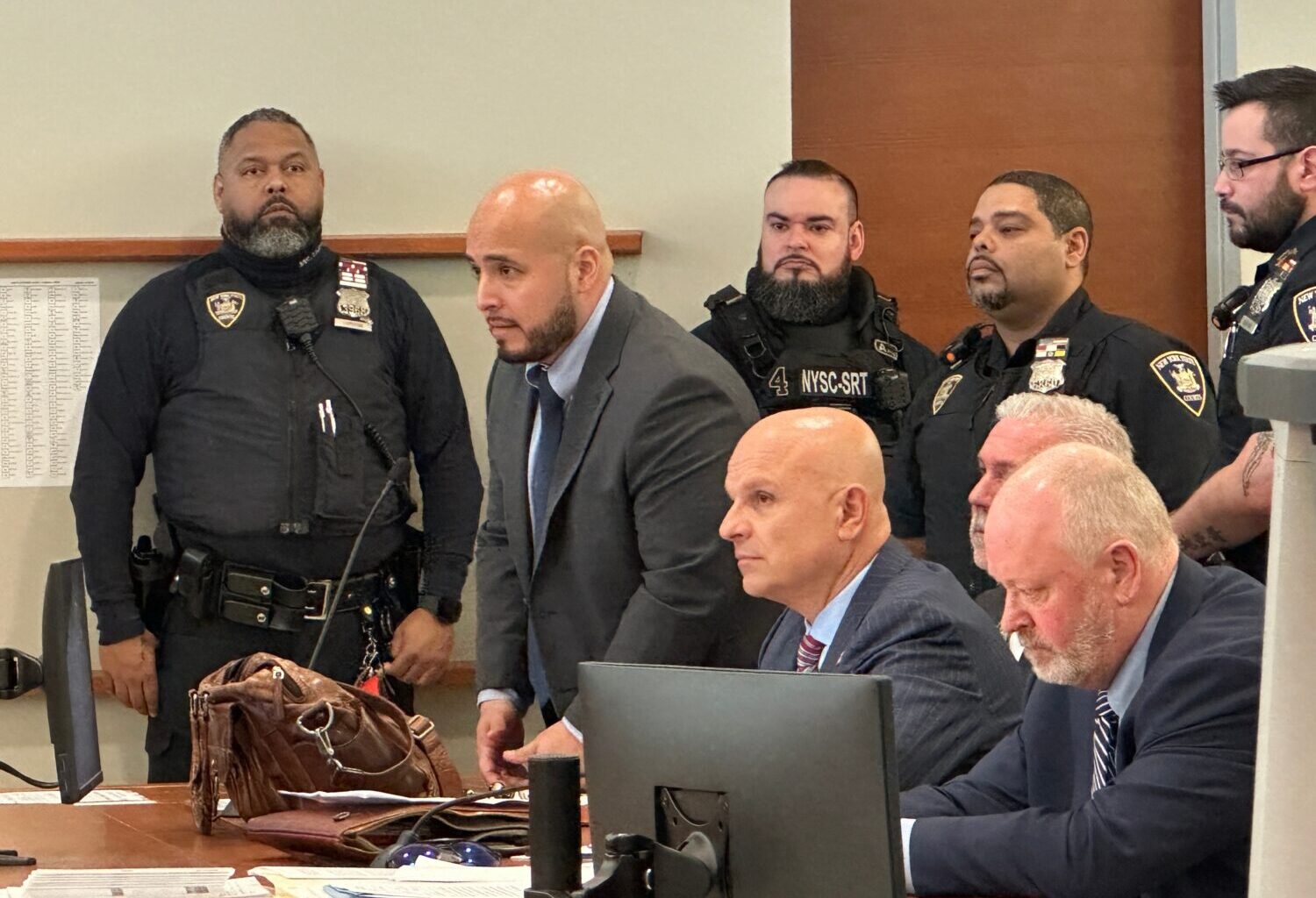 Former New York City police sergeant Erik Duran stands during his sentencing hearing at the Bronx C...