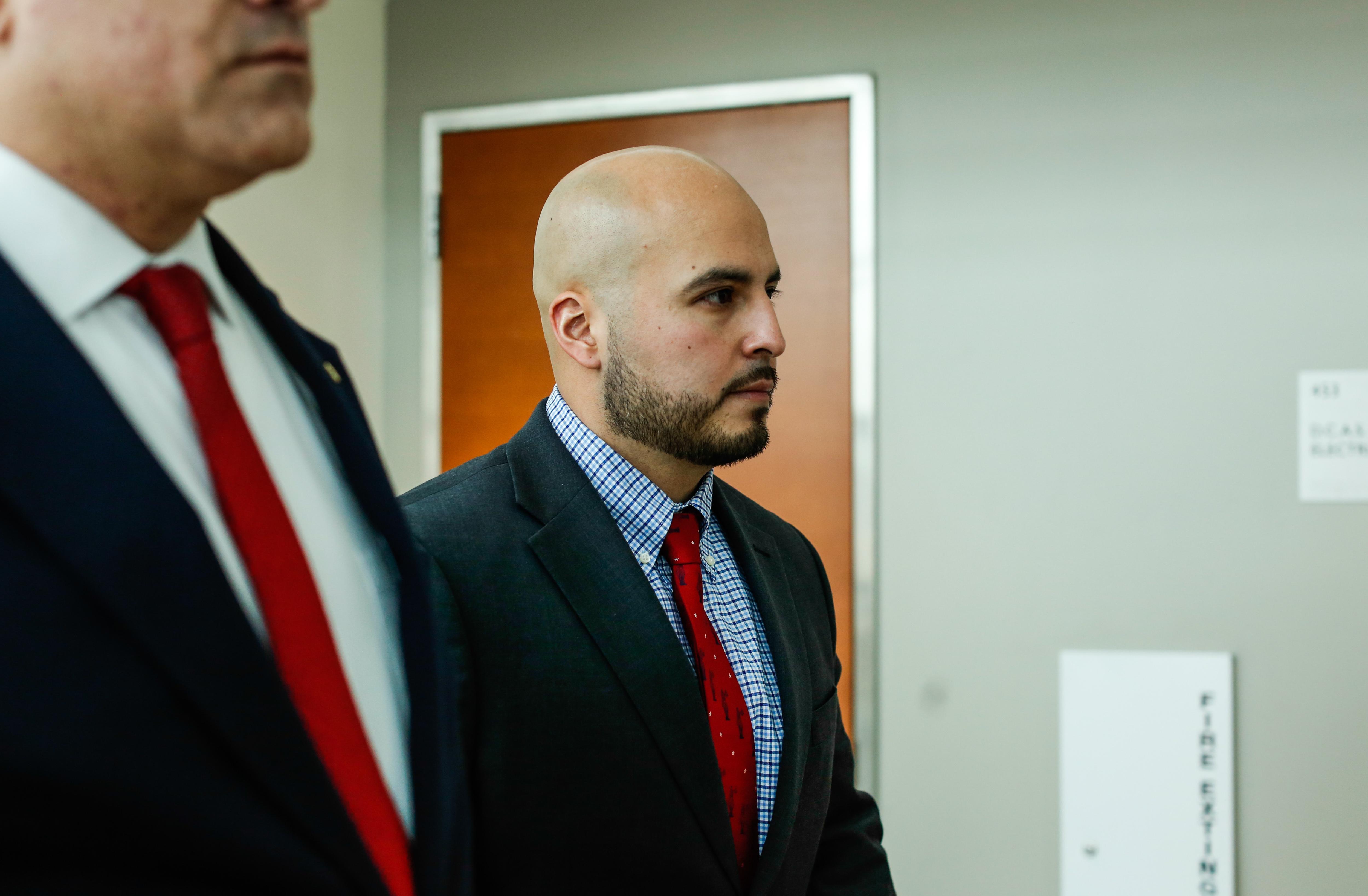 FILE – New York police officer Erik Duran, who is...