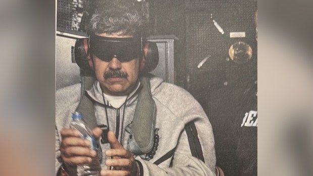 Former Venezuelan President Nicolas Maduro is pictured blindfolded aboard the USS Iwo Jima after being captured by U.S. forces.