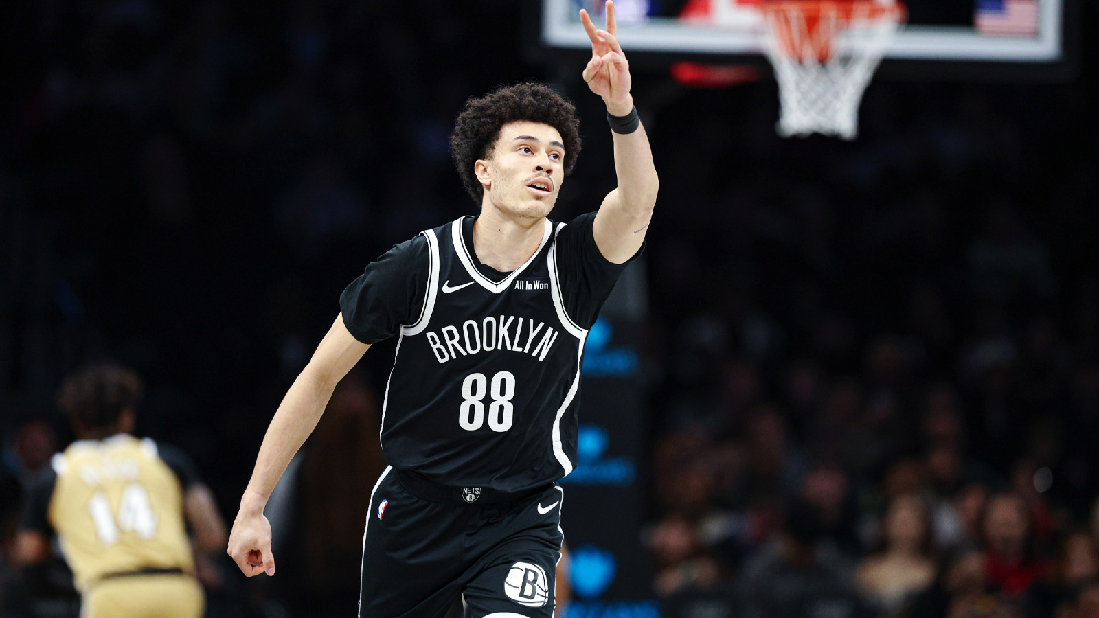 Brooklyn Nets guard Nolan Traore (88) reacts after making a three point basket during the first quarter against the Washington Wizards at Barclays Center.