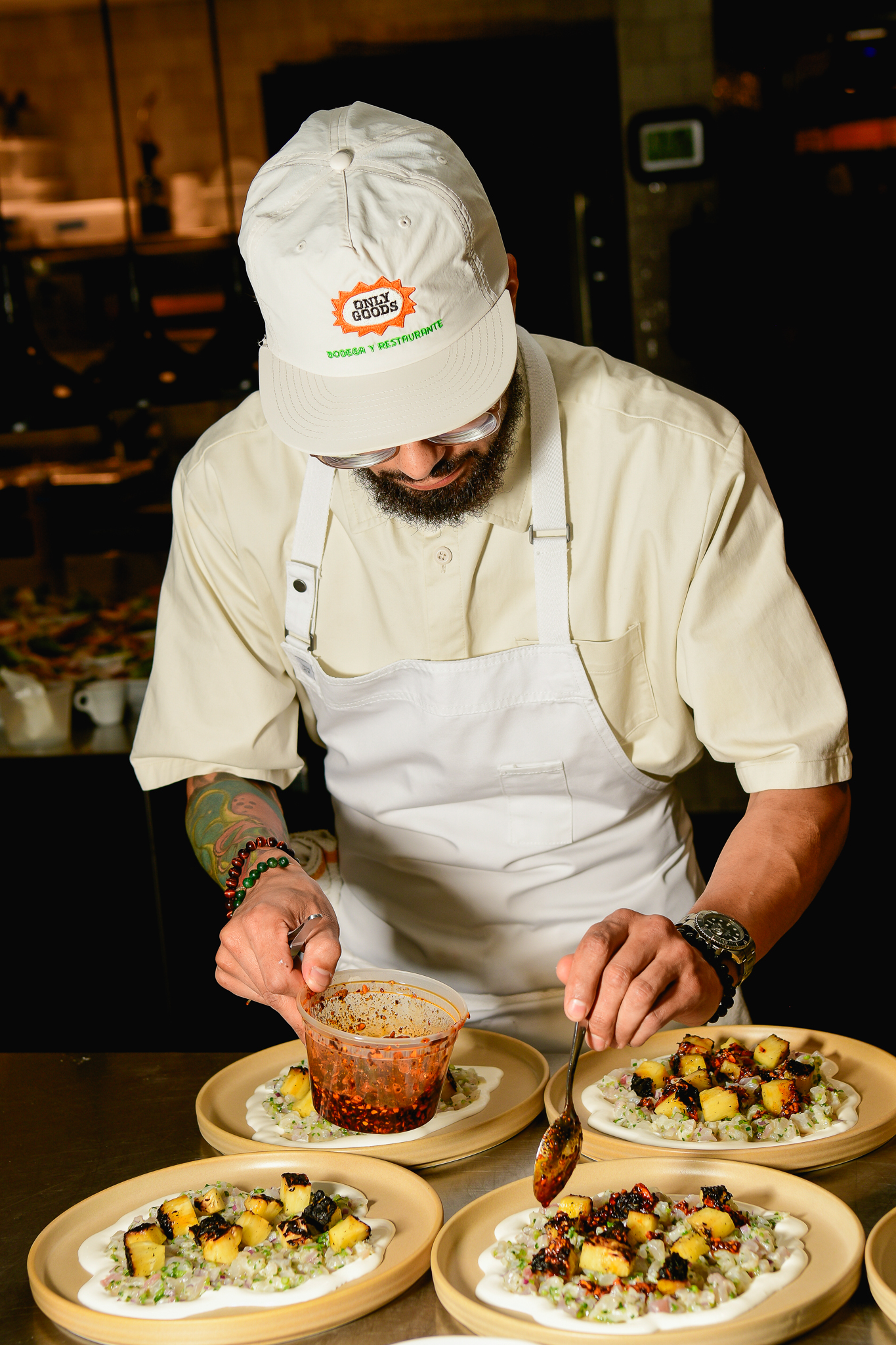 A chef plating food.