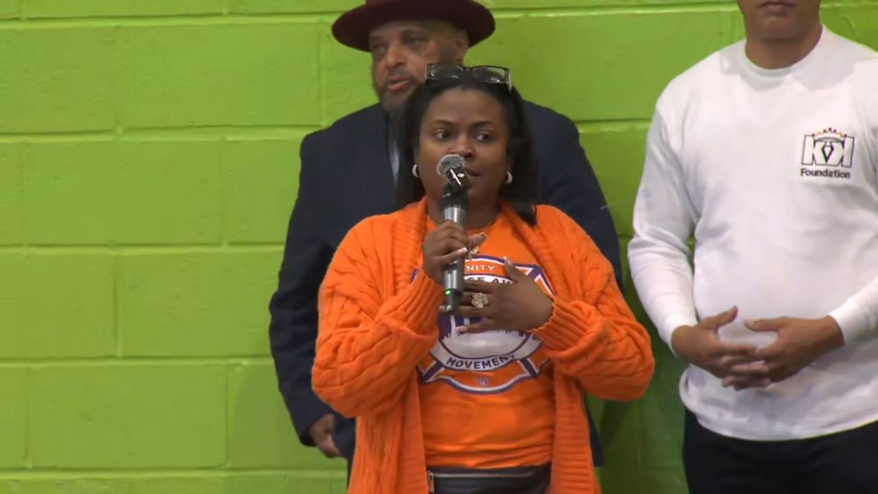 Concerned Queens residents gathered Tuesday night for an emergency meeting after a 15-year-old was fatally shot in Roy Wilkins Park last week. (Spectrum News NY1)