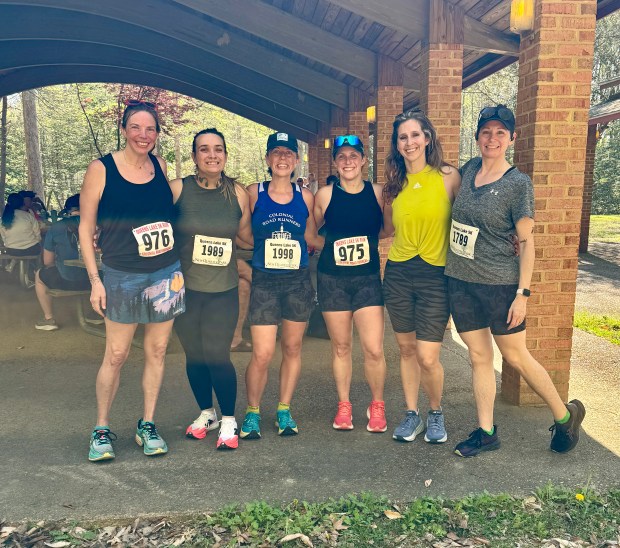 Pictured from left are Annie VanSkiver, Katie Kipers, Tricia Murphy, Kate Uptmor, Jessica Anderson and Shannon Foxx-Day at the 32nd annual Queens Lake 5K on April 4. Tricia Murphy