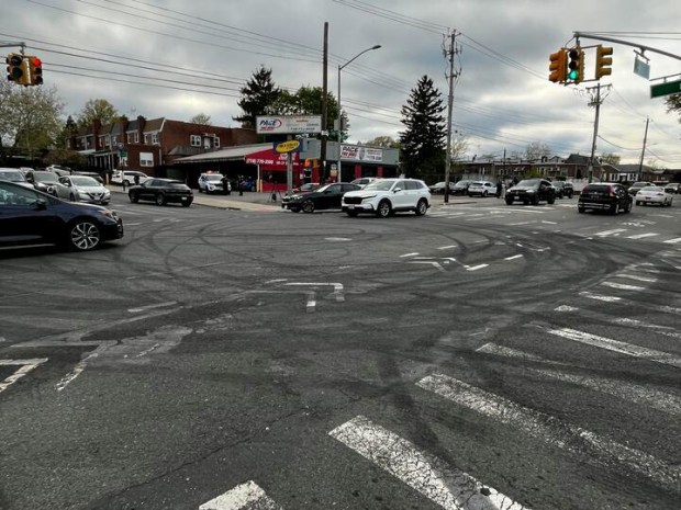 A wild pattern of tire skid marks was left on the street at the intersection after the early-morning car takeover. Locals said the skid marks were new. (Julian Roberts-Grmela / New York Daily News)