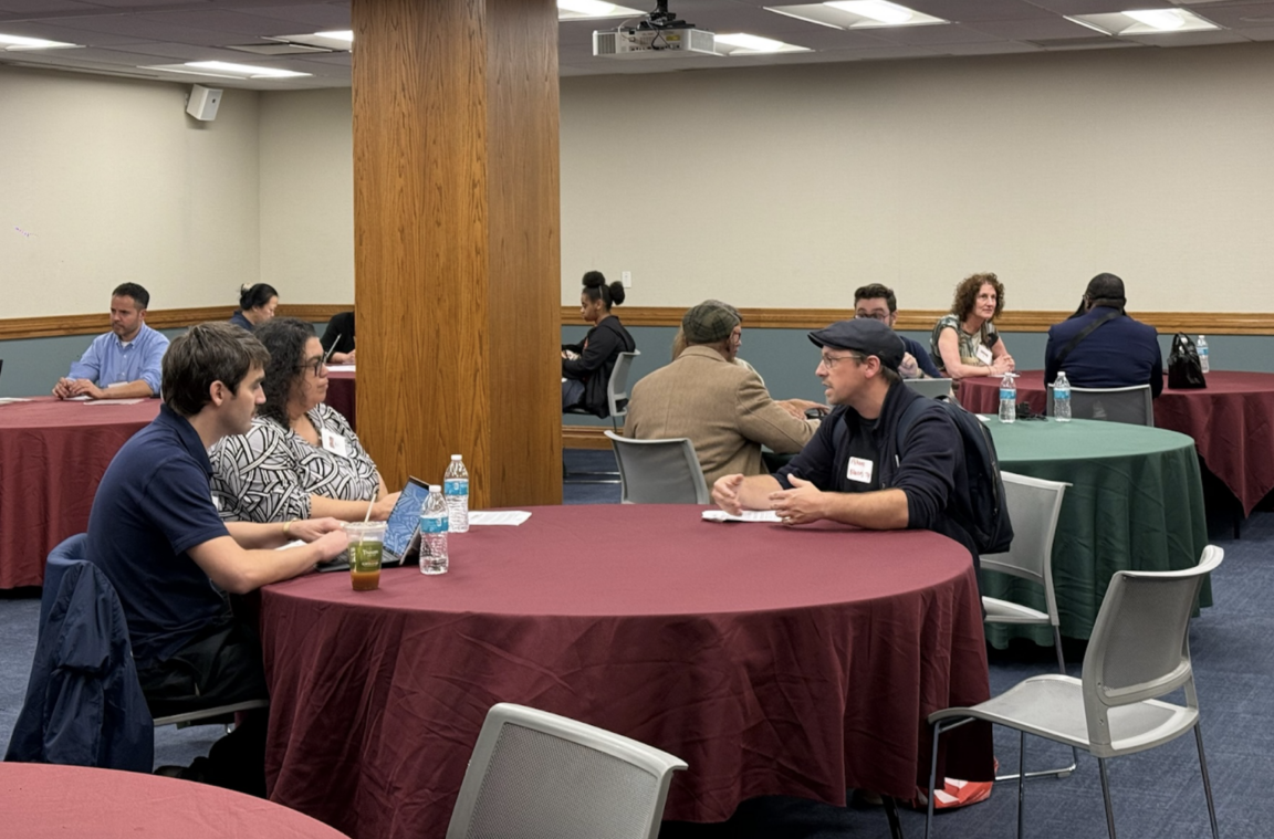 Inside the testimony room, where residents had three minutes to meet with city officials. (Credit: Carol Chen)