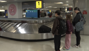 Travelers waiting at baggage claim at Newark Liberty International Airport on Nov. 11, 2025.