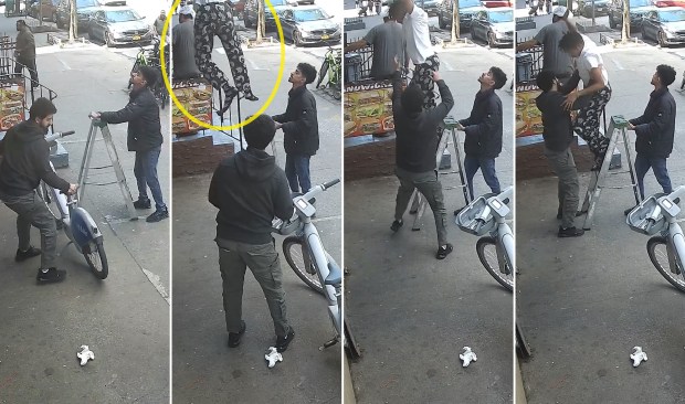 Locals use a ladder to help rescue a person from a burning building at 660 E. 187th St. in the Bronx on Tuesday, April 21, 2026. (Courtesy of Abdulruman Albahri)