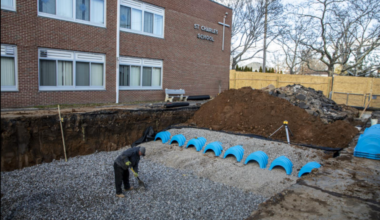 A worker digs as part of a stormwater management project at St. Charles School in the Oakwood section of Staten Island in this undated photo.