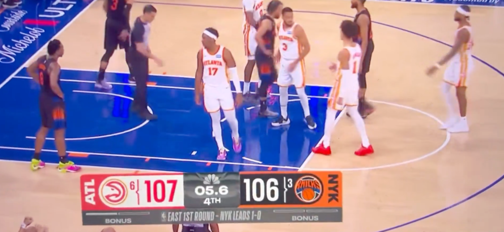 A basketball game between the Atlanta Hawks and the New York Knicks with the Hawks leading 107 to 106 with 5.6 seconds left in the 4th quarter.