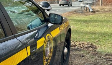 NY State Trooper vehicle parked on the shoulder of a road in the Finger Lakes region.