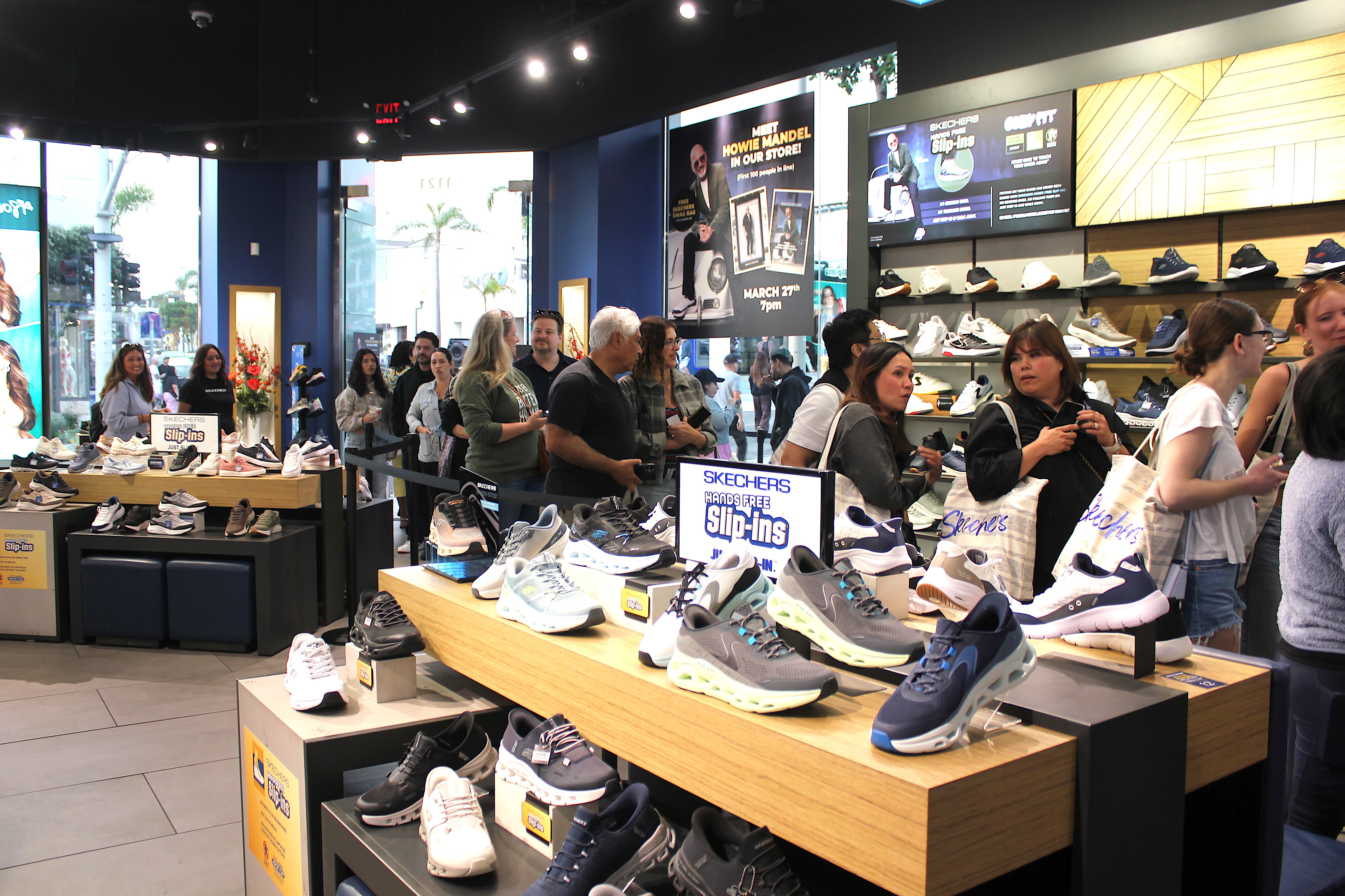 Dozens lined up to meet Skechers ambassador Howie Mandel, who...