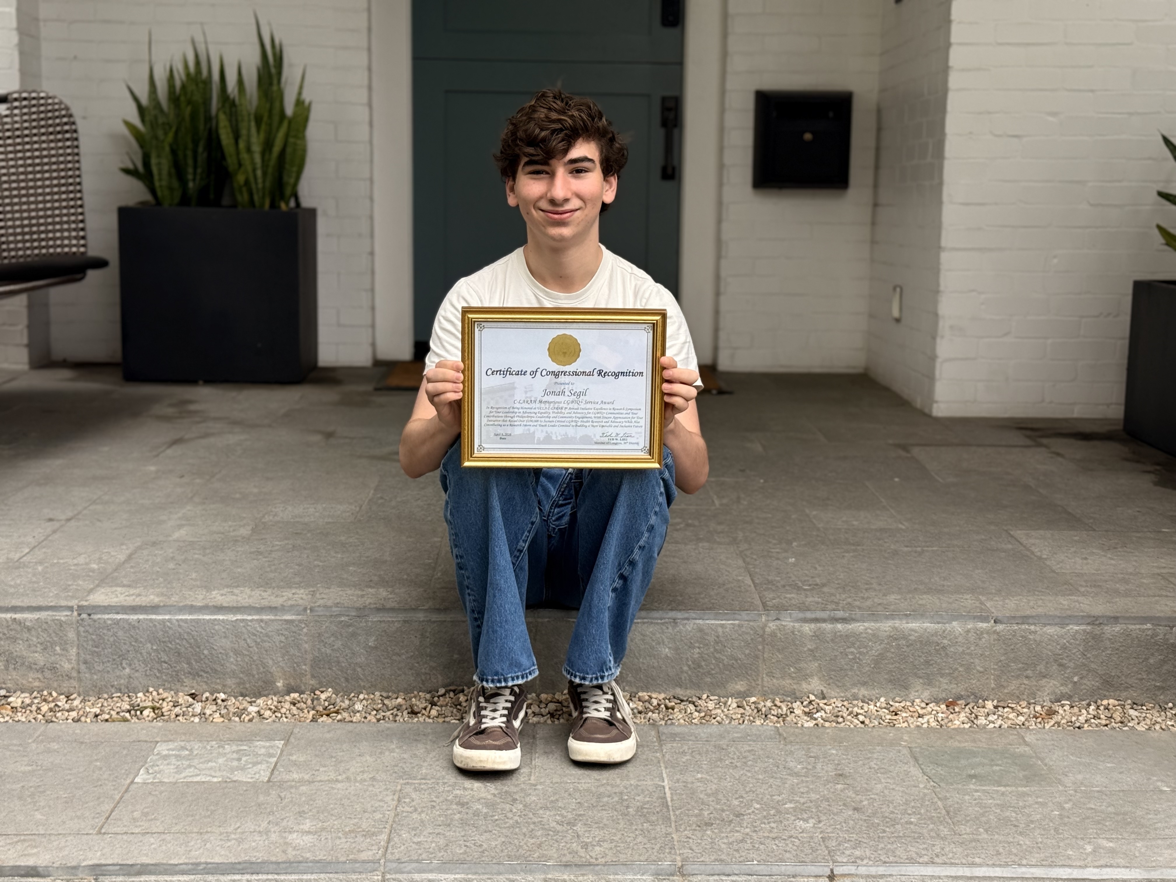 Jonah Segil of Manhattan Beach holds the Congressional Certificate of...