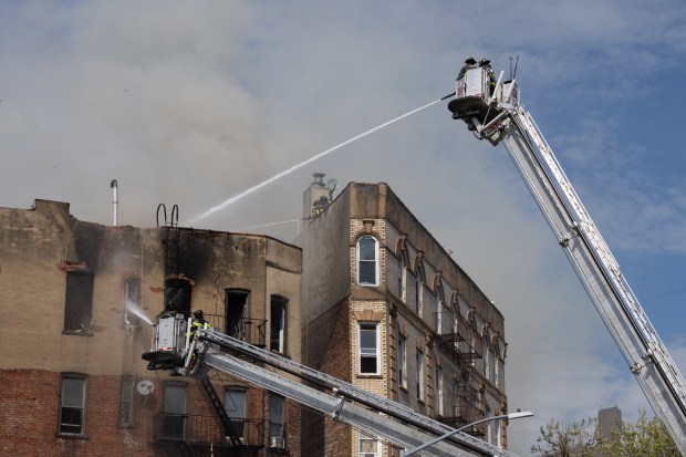 FDNY members work a fire at 660 E. 187th St. Tuesday, April 21, 2026 in the Bronx, New York. (Barry Williams/ New York Daily News/)