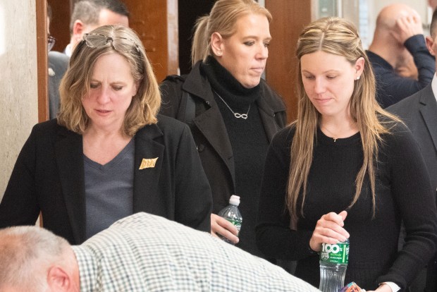 Queens District Attorney Melinda Katz, left, and Stephanie Diller, widow of NYPD Det. Jonathan Diller, leave court after closing arguments in the trial of Diller's accused killer, Guy Rivera, at Queens Criminal Court in Queens, New York, on Tuesday, March 31, 2026. (Gardiner Anderson / New York Daily News)